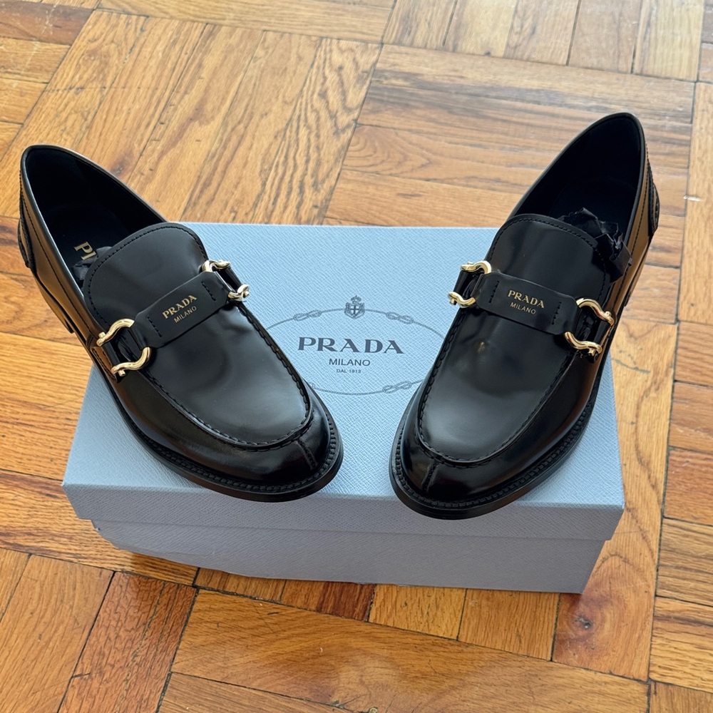 Prada  Glossy Black Slip-On Loafers NEVER WORN. THIS SEASON.